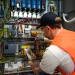 electrician-working-on-panel